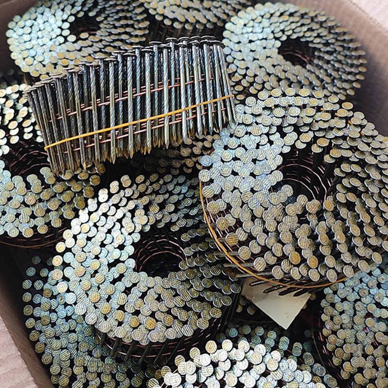 How does surface treatment of coil nails improve nail feeding stability?